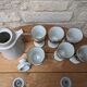 Old coffee service with 6 mazagrans and coffee pot with blue floral decoration
