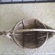 Asian artisanal basket in the shape of a boat