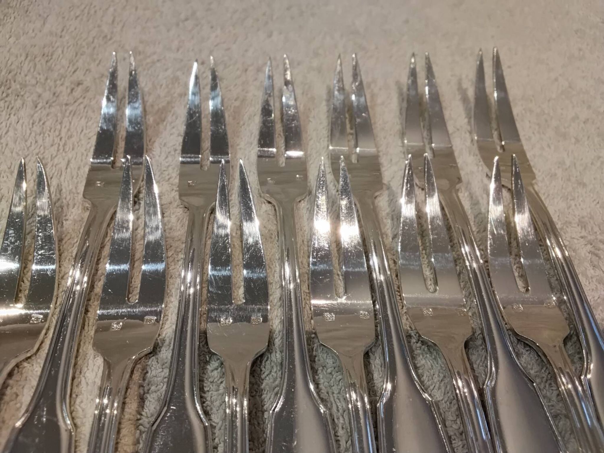 12 silver-plated metal snail forks by silversmith Noel Collet, shell design