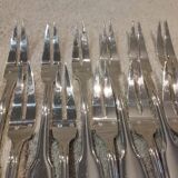 12 silver-plated metal snail forks by silversmith Noel Collet, shell design