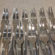 12 silver-plated metal snail forks by silversmith Noel Collet, shell design