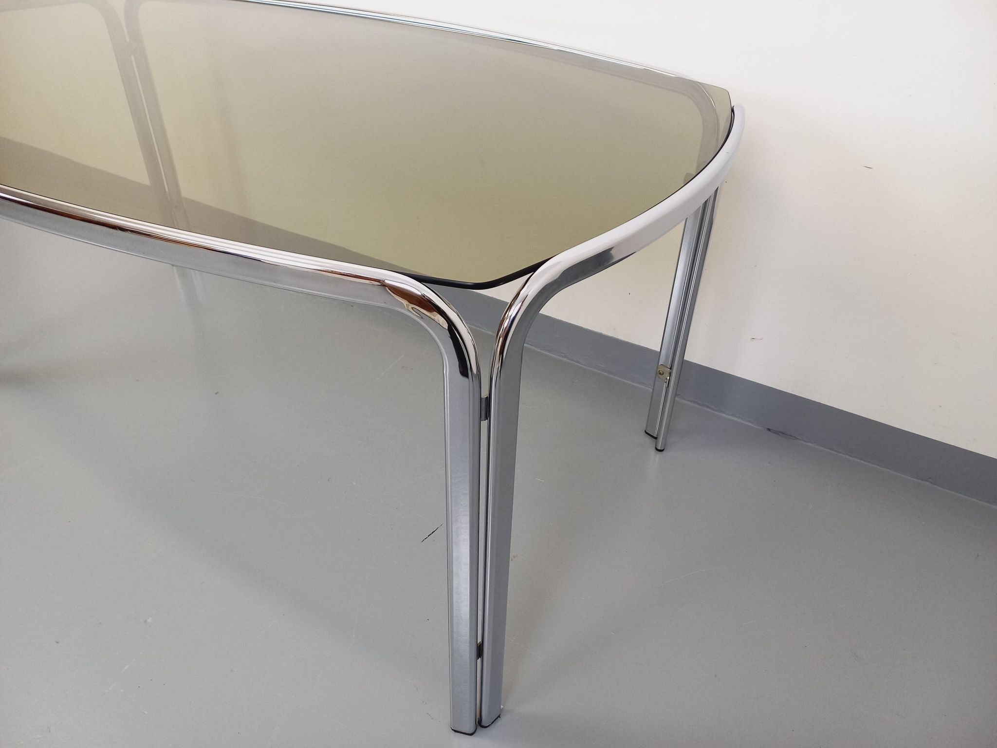 Vintage curved rectangular dining table in smoked glass and chrome metal