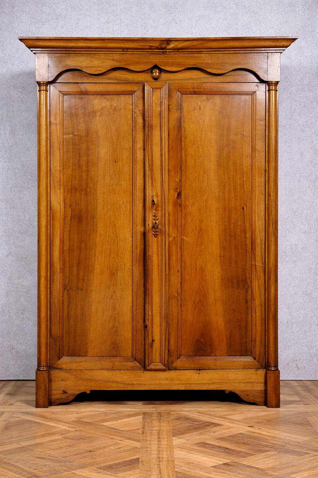Empire period wardrobe, made of solid walnut, dating from the early 19th century.