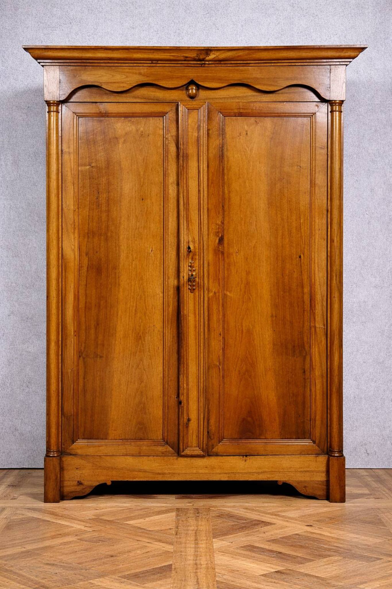 Empire period wardrobe, made of solid walnut, dating from the early 19th century.