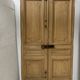 Pair of Haussmann-style double passage doors in patinated oak from the 19th century.