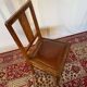 Set of 4 Art Deco chairs in oak and brown leather.