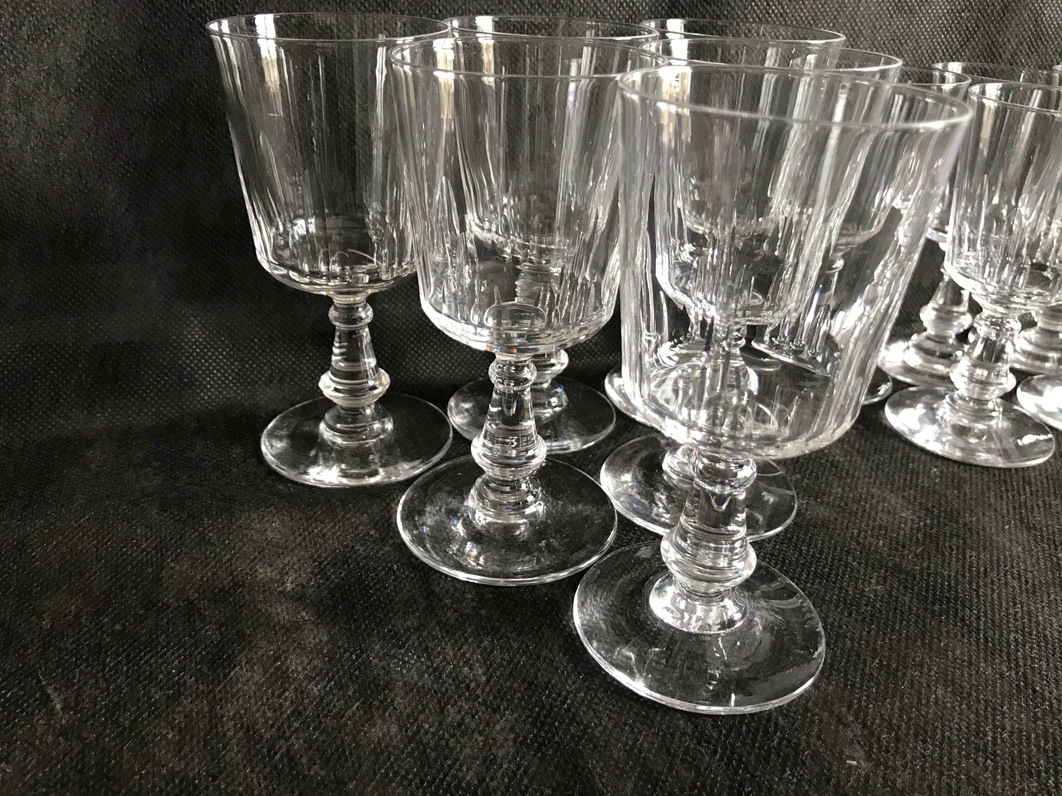 11 glasses and 1 wine carafe