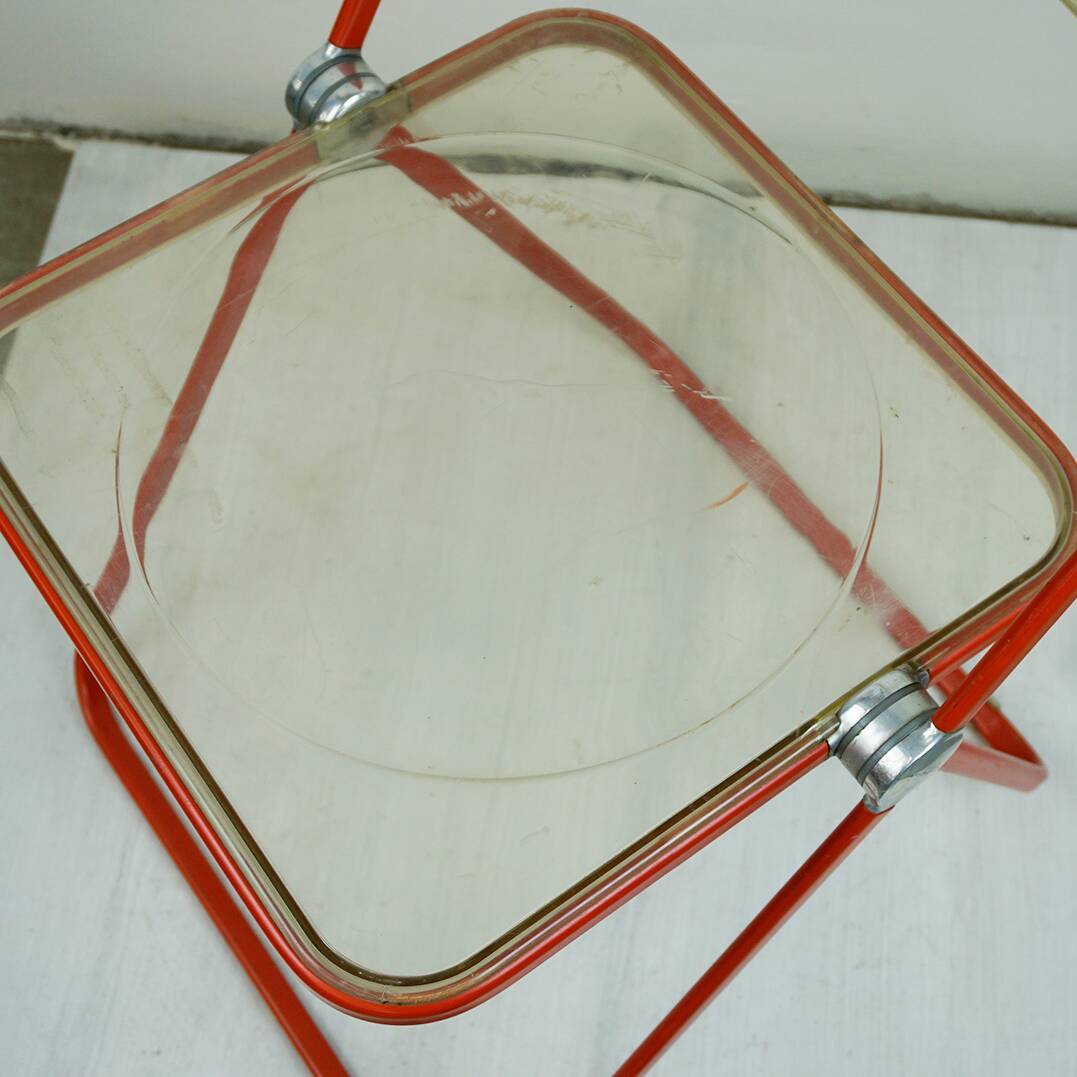 Red Plia Lucite folding chair by G. Piretti for Castelli Italy