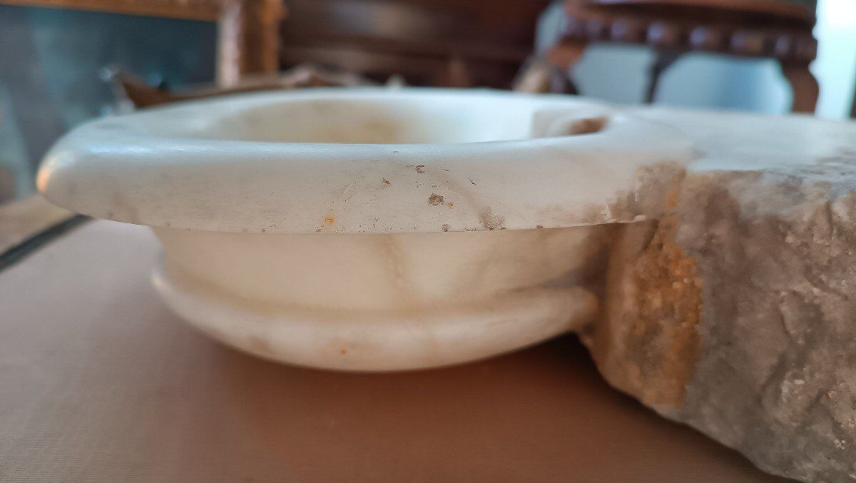 Antique holy water font in Italian Baroque marble