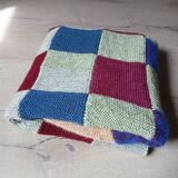 Hand knitted patchwork plaid