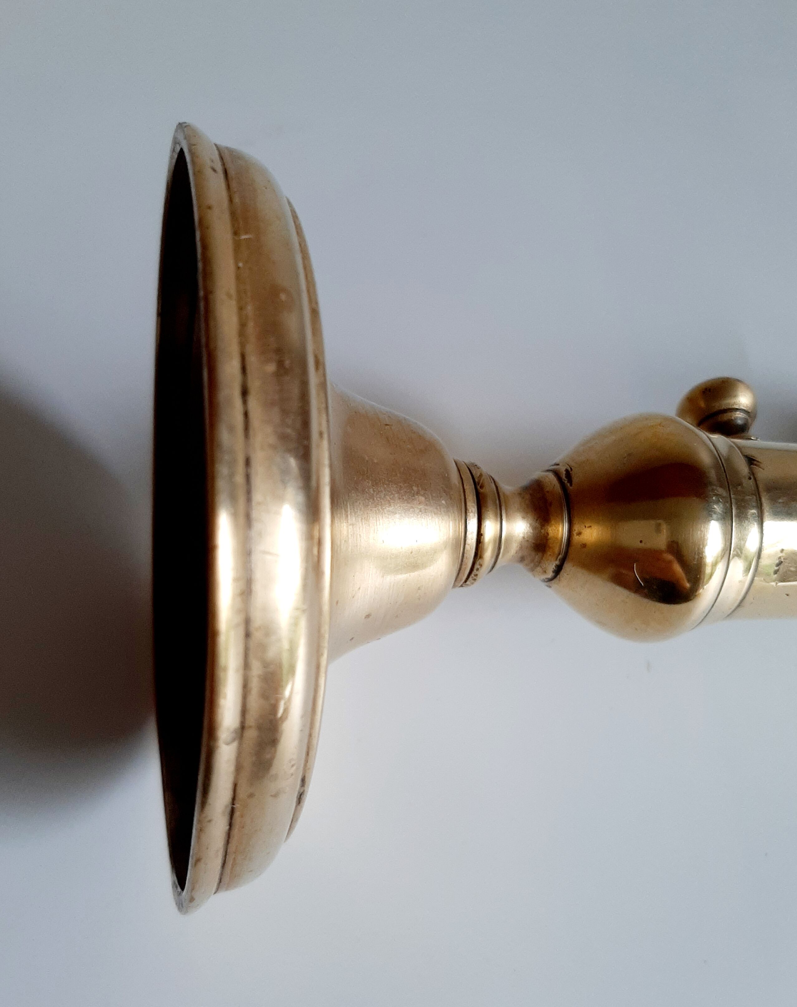 Golden brass candle holder