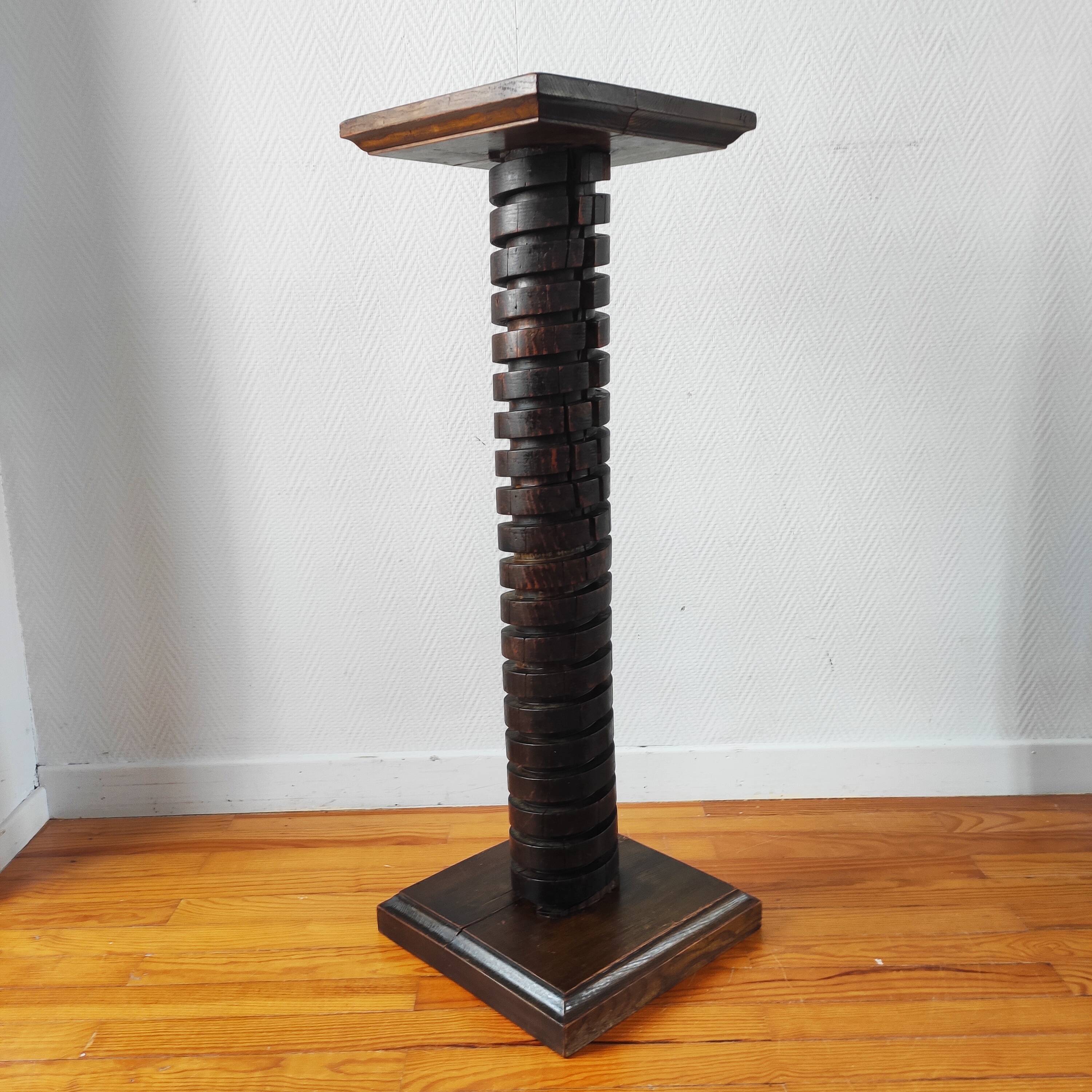 Brutalist column – old Burgundy press screw