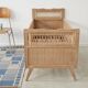 Children's bed in wood and sandblasted rattan from the 1960s.