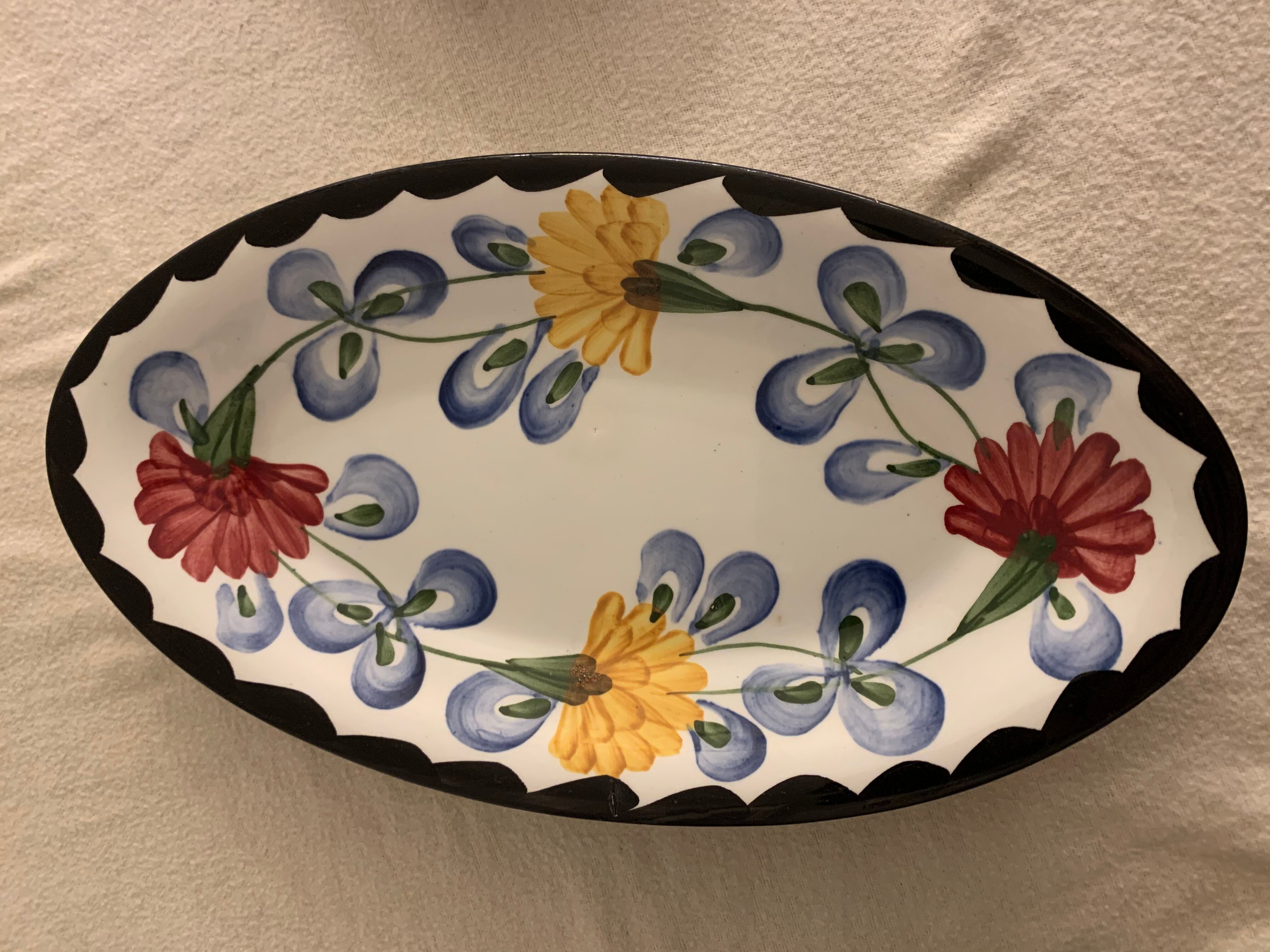 Pair of floral ravines in ancient earthenware Onnaing and CM Paris model Clovers