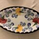 Pair of floral ravines in ancient earthenware Onnaing and CM Paris model Clovers
