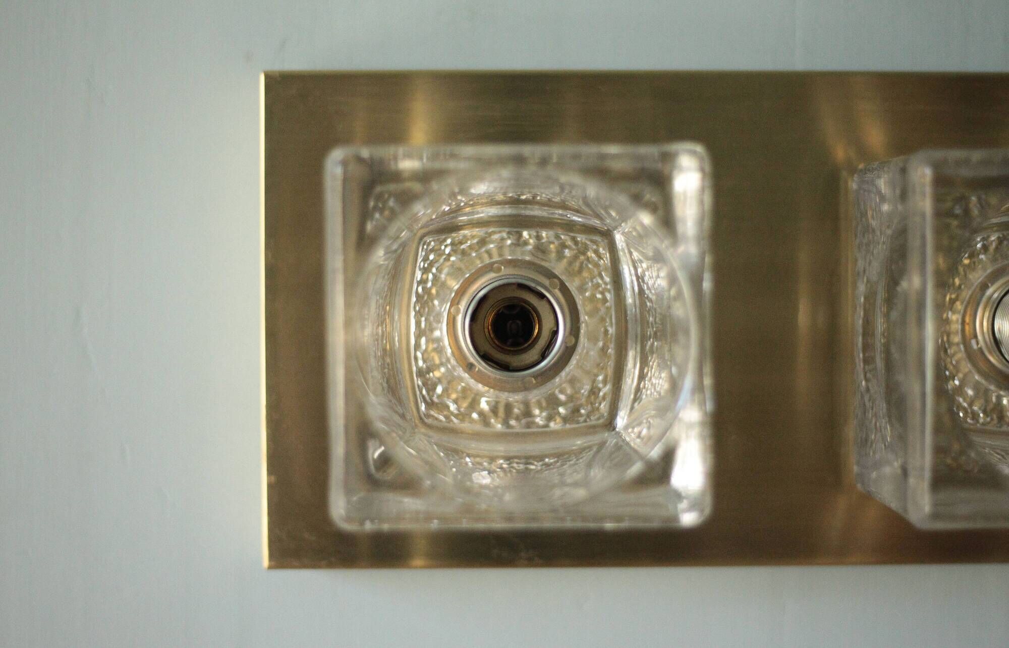 Peill & Putzler wall light, vintage, brass and thick glass wall sconce.