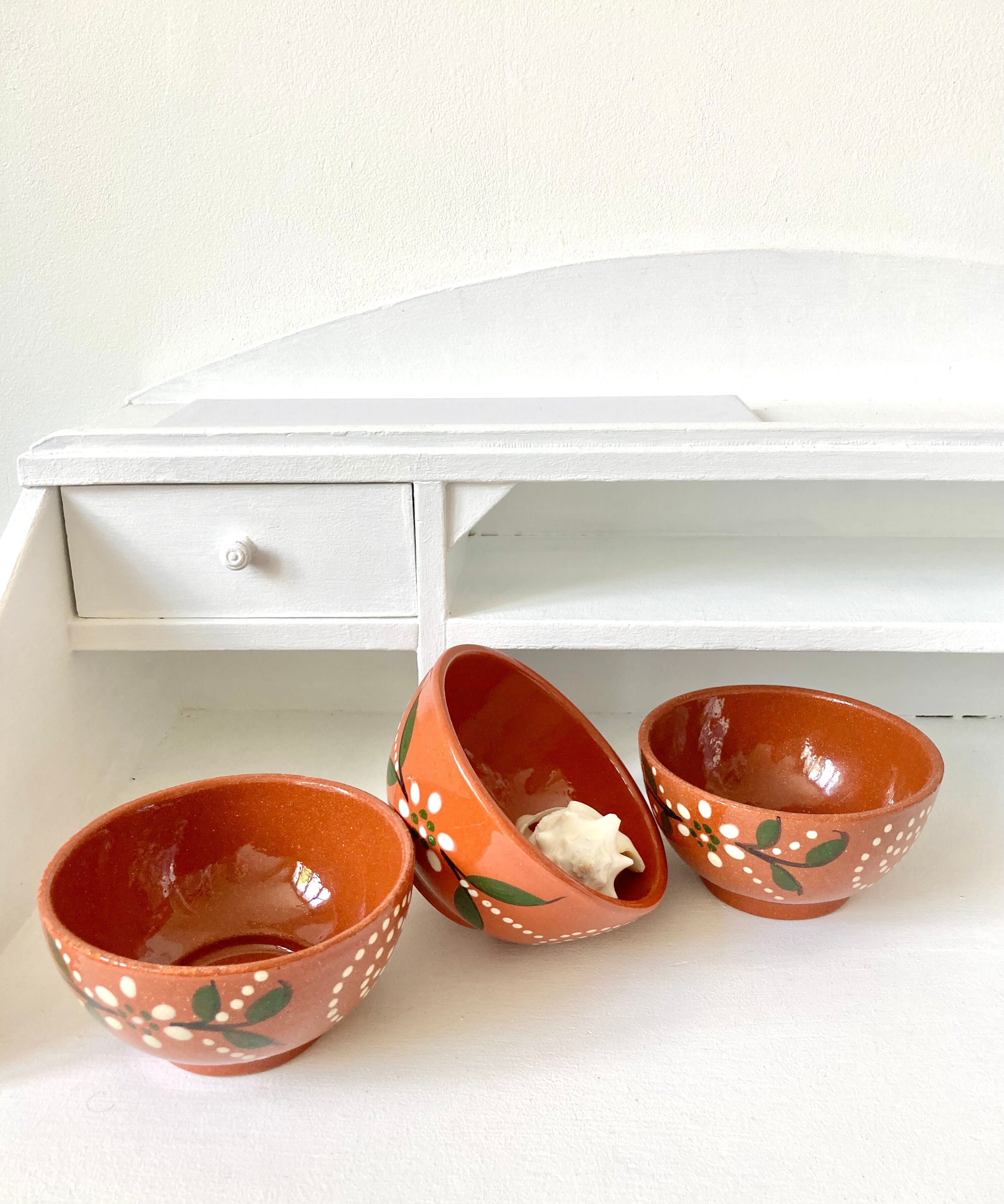 Vintage terracotta bowls decorated flowers