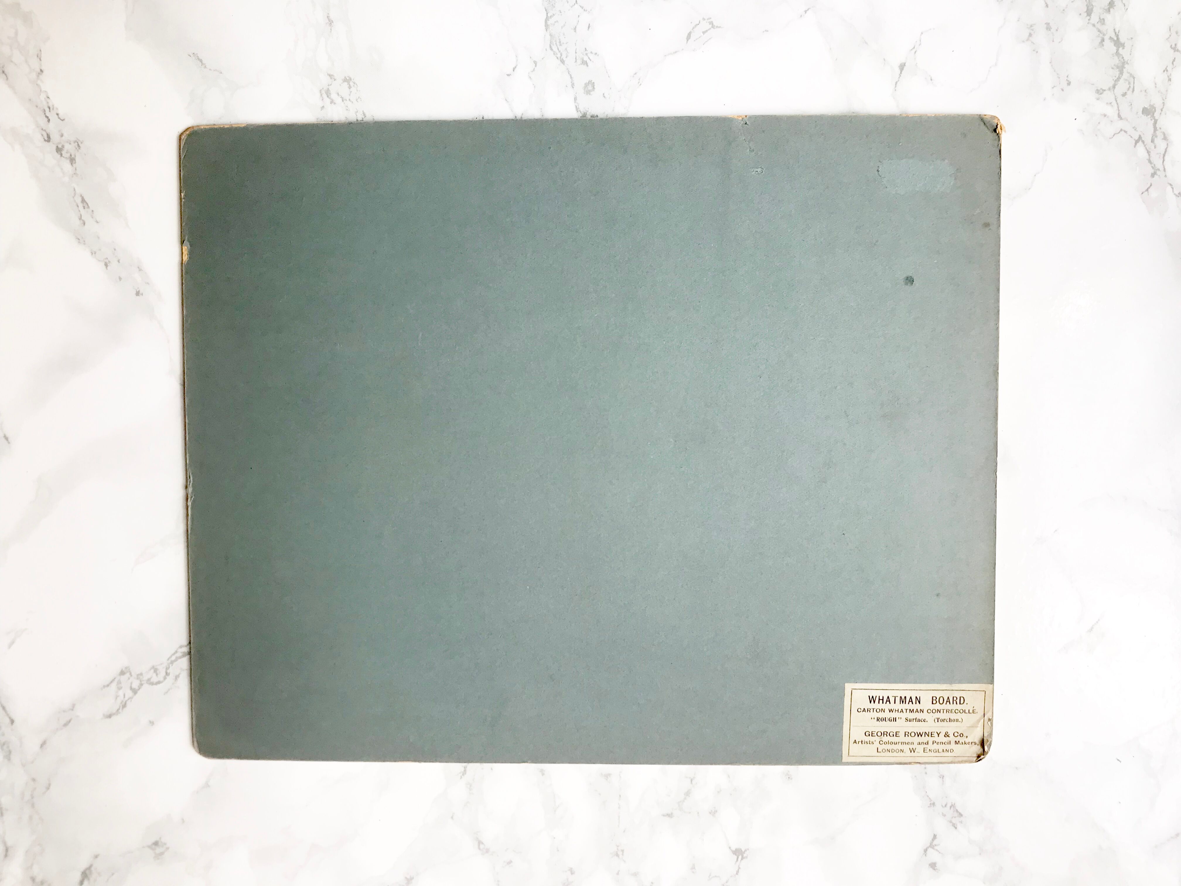 Old watercolor depicting a still life at the tea box