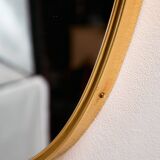 Metal and brass framed mirror