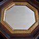 Octagonal renaissance mirror in oak and gold, 28 cm