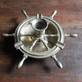 Brass ashtray and candlestick shaped boat bar