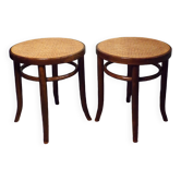 Pair of curved caned wooden stools
