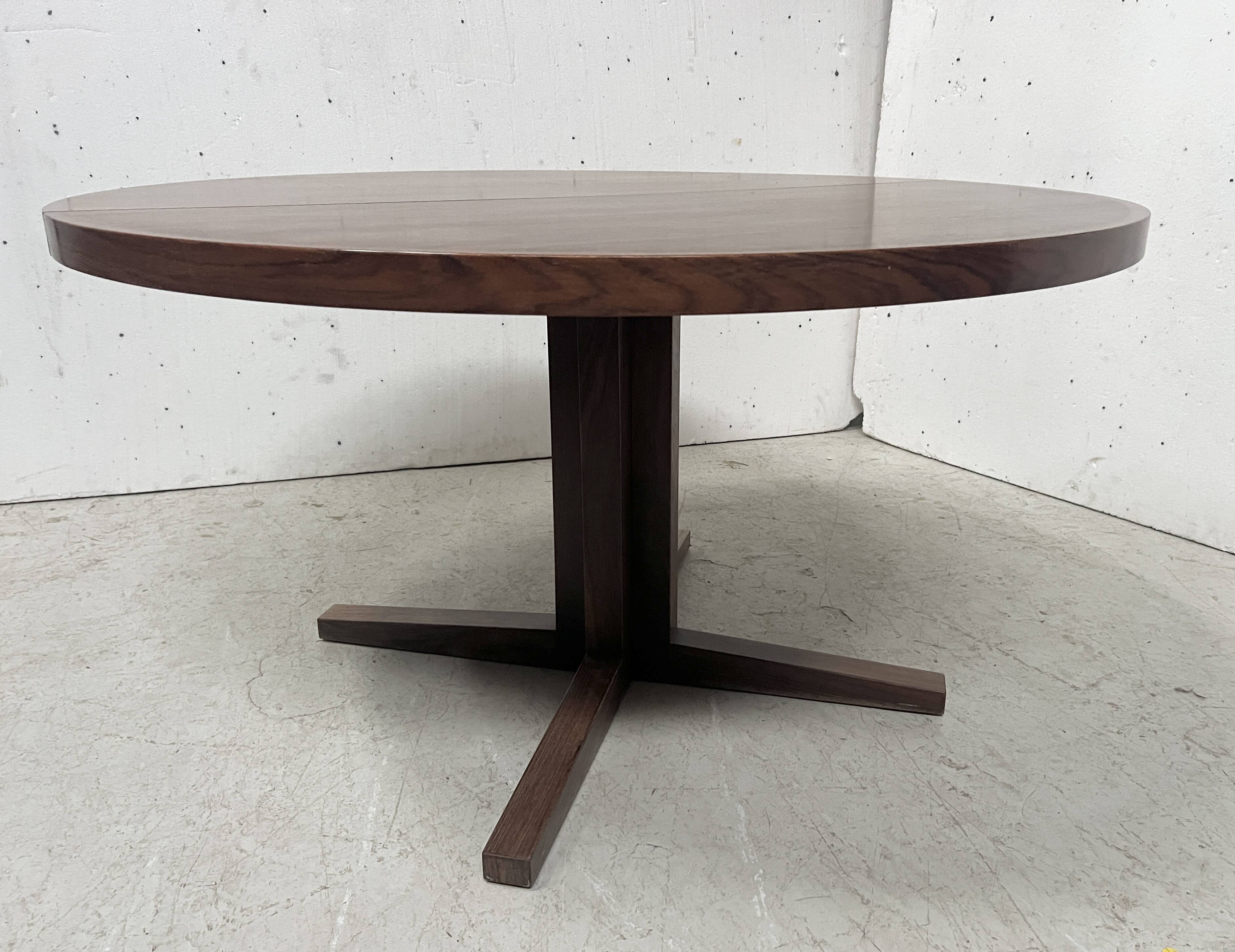 Scandinavian dining table in rosewood veneer "by John MORTENSEN"