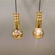 Frimann Goldstar pendant lights made by Philips in the 1970s. Model SPYBALL