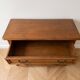Antique wooden chest of drawers with three drawers.