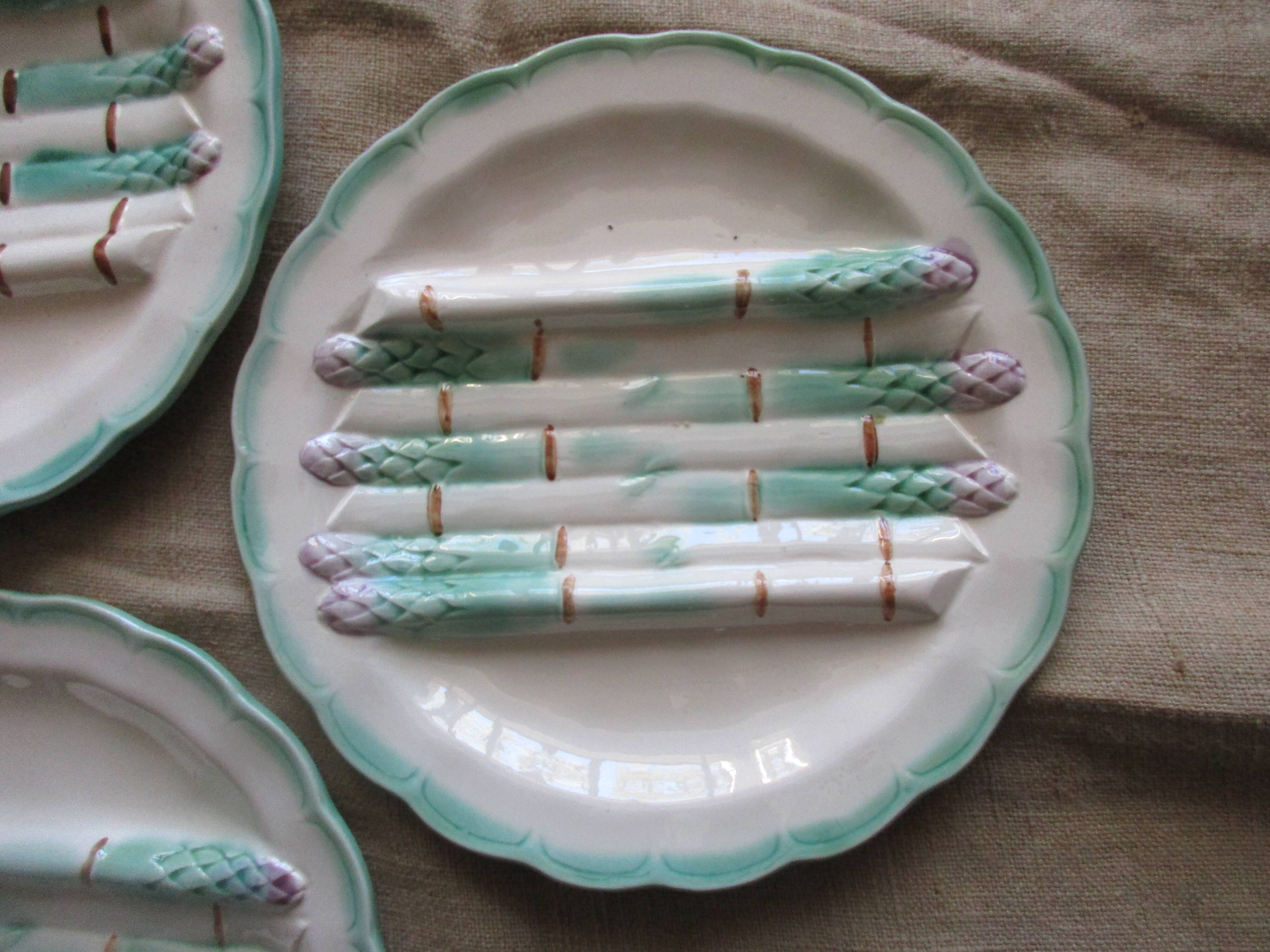 3 plates dishes a asperges in barbotine brand longchamp terre of fer