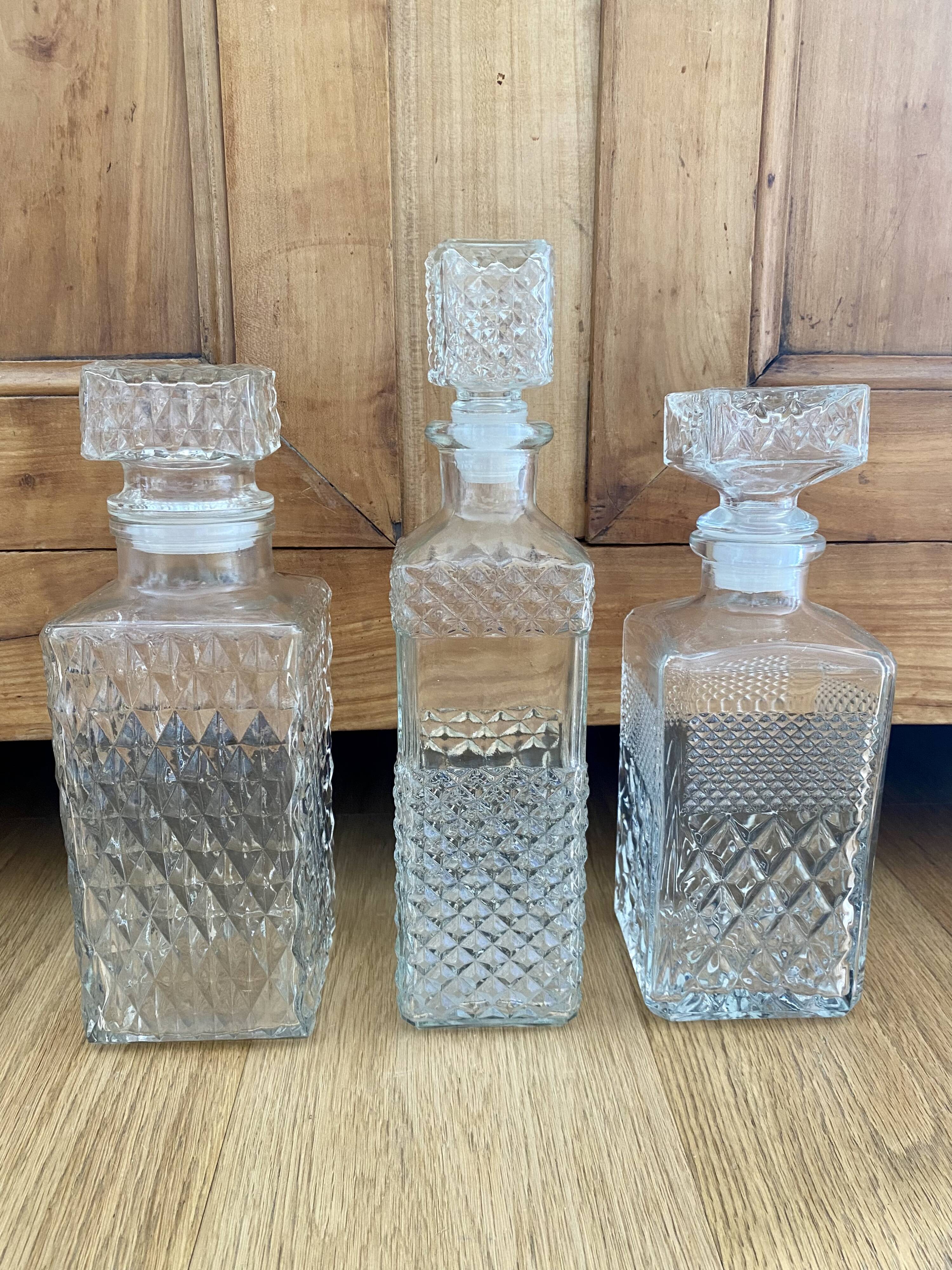 Set of 3 bottle vintage molded glass whiskey decanter
