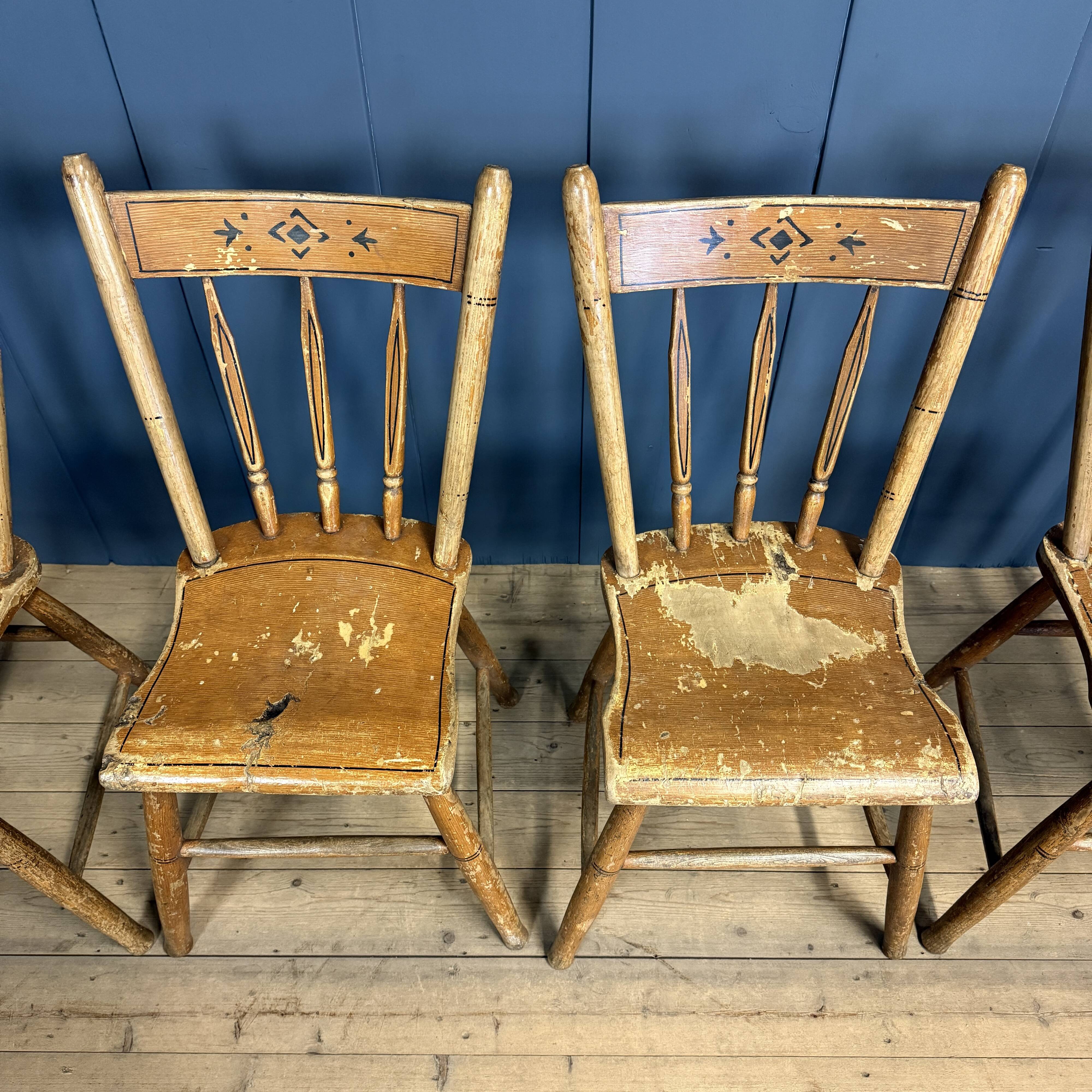 Set of four painted Dutch kitchen chairs.