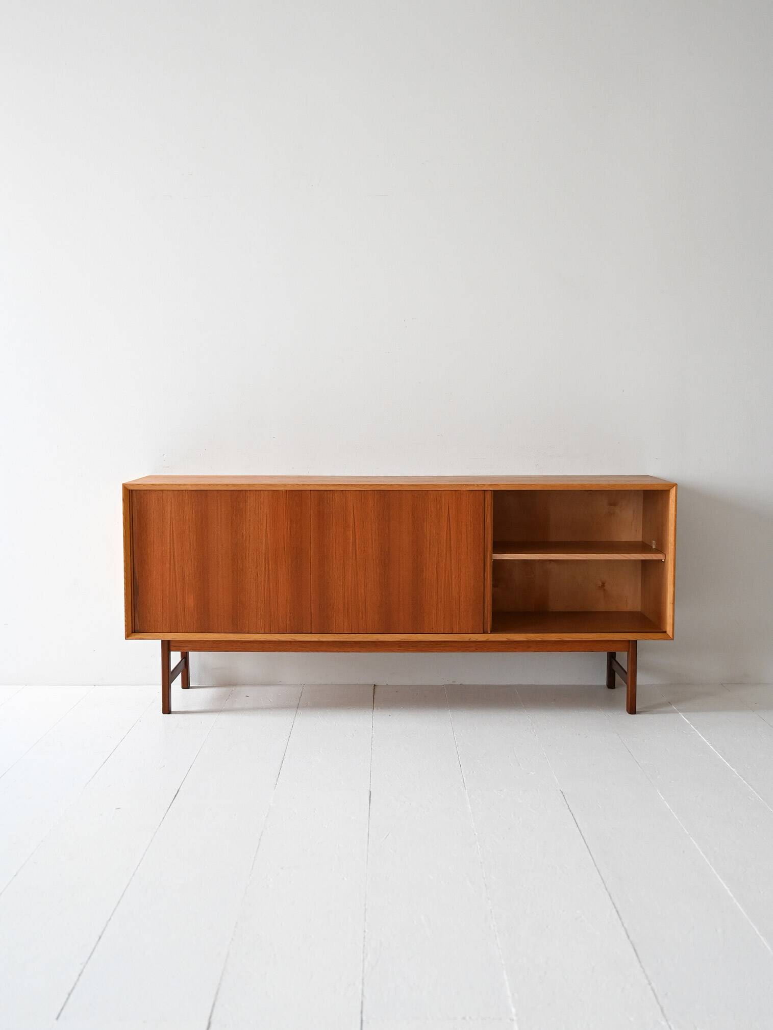 Vintage Scandinavian teak sideboard with metal-lined drawers