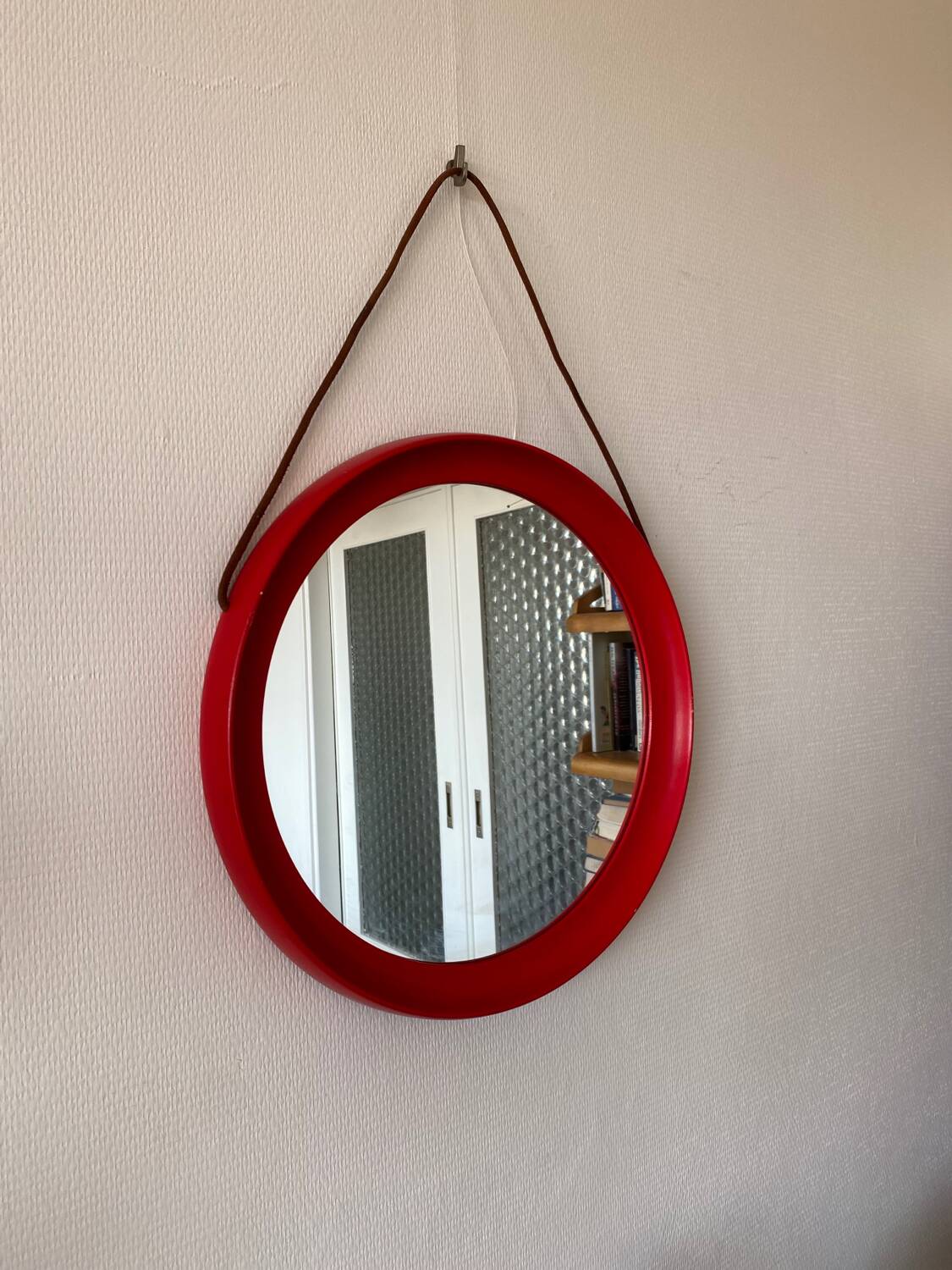 Mid-Century Scandinavian Red Round Wooden Mirror with Leather Strap, 1950s