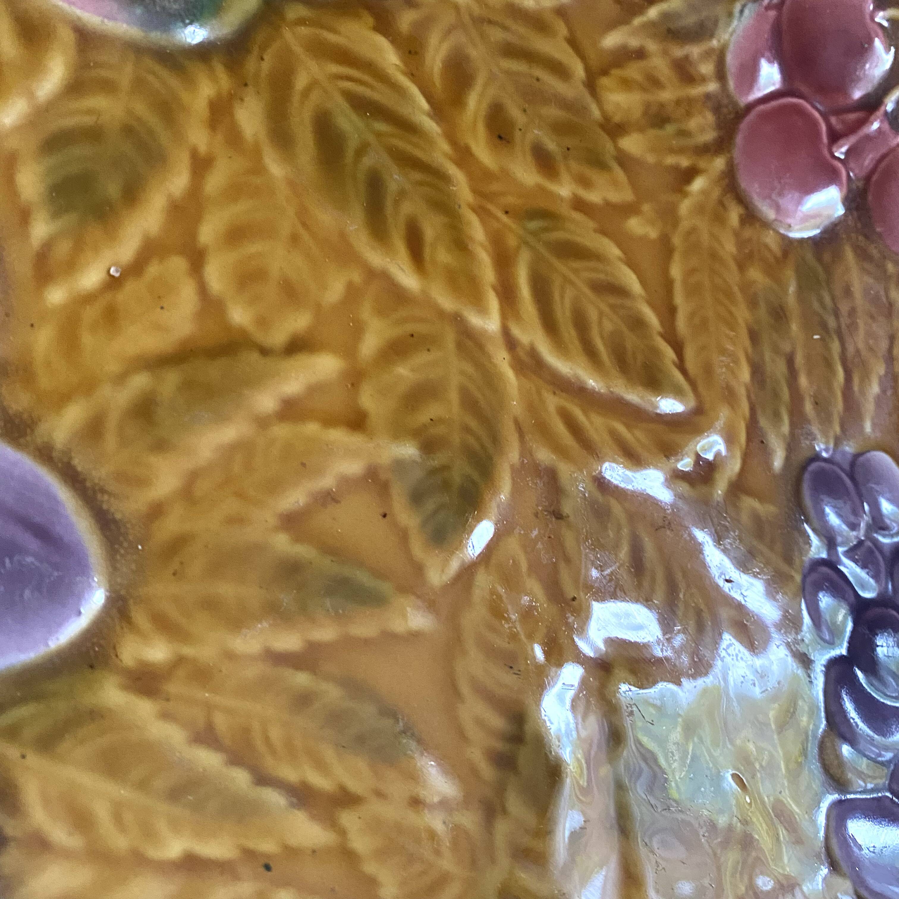 Large round Sarreguemines slip dish with fruit decoration