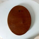 Antique oval mirror in gilded solid wood