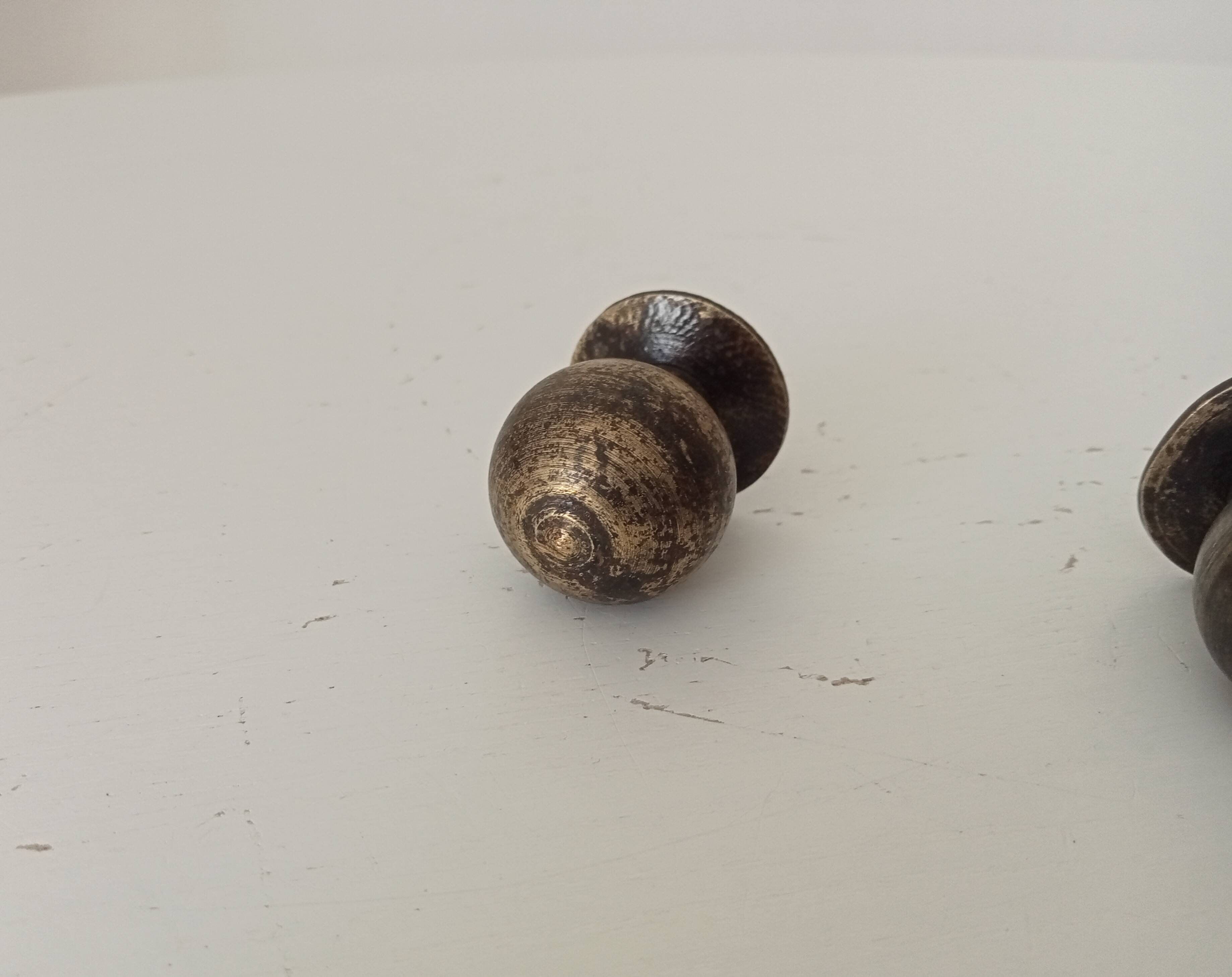 Pair of antique bronze furniture handles.