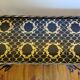 Vintage coffee table wrought iron and black and gold ceramic