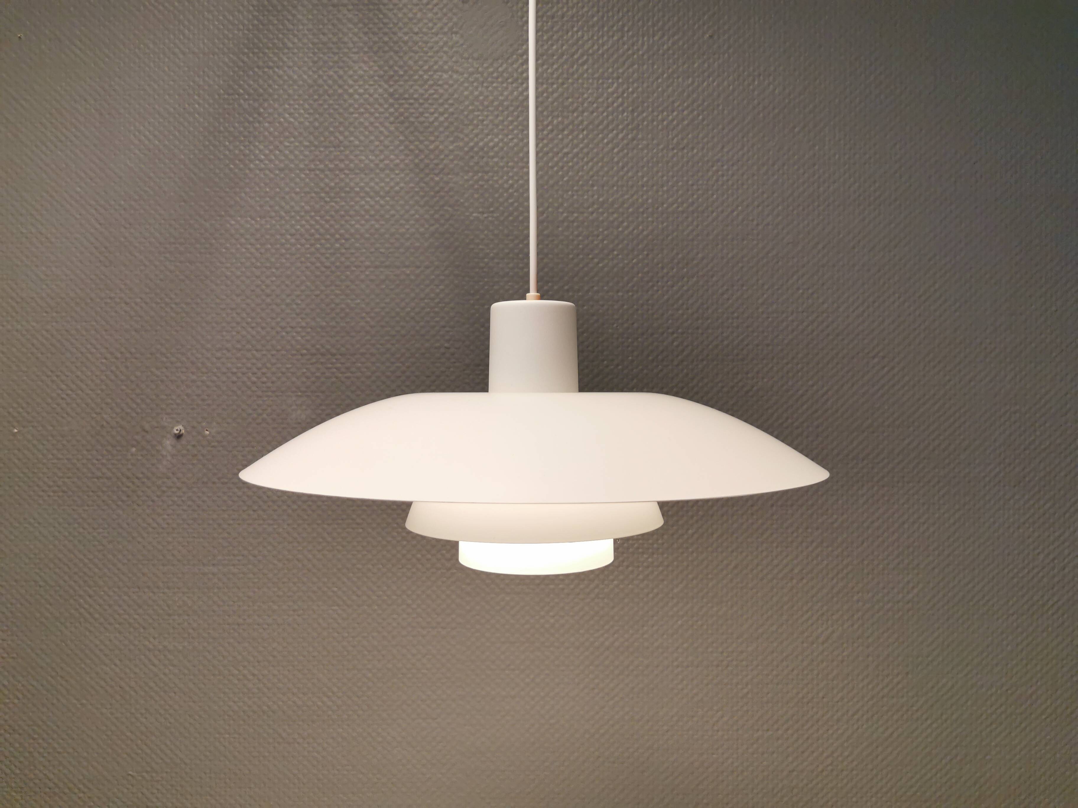 Beautiful older PH 4/3 hanging lamp, in white, with original orange suspension.