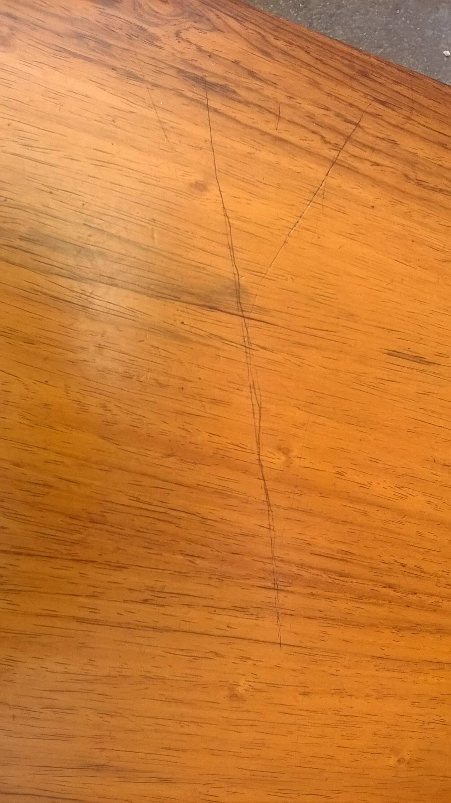 Extendable teak dining table