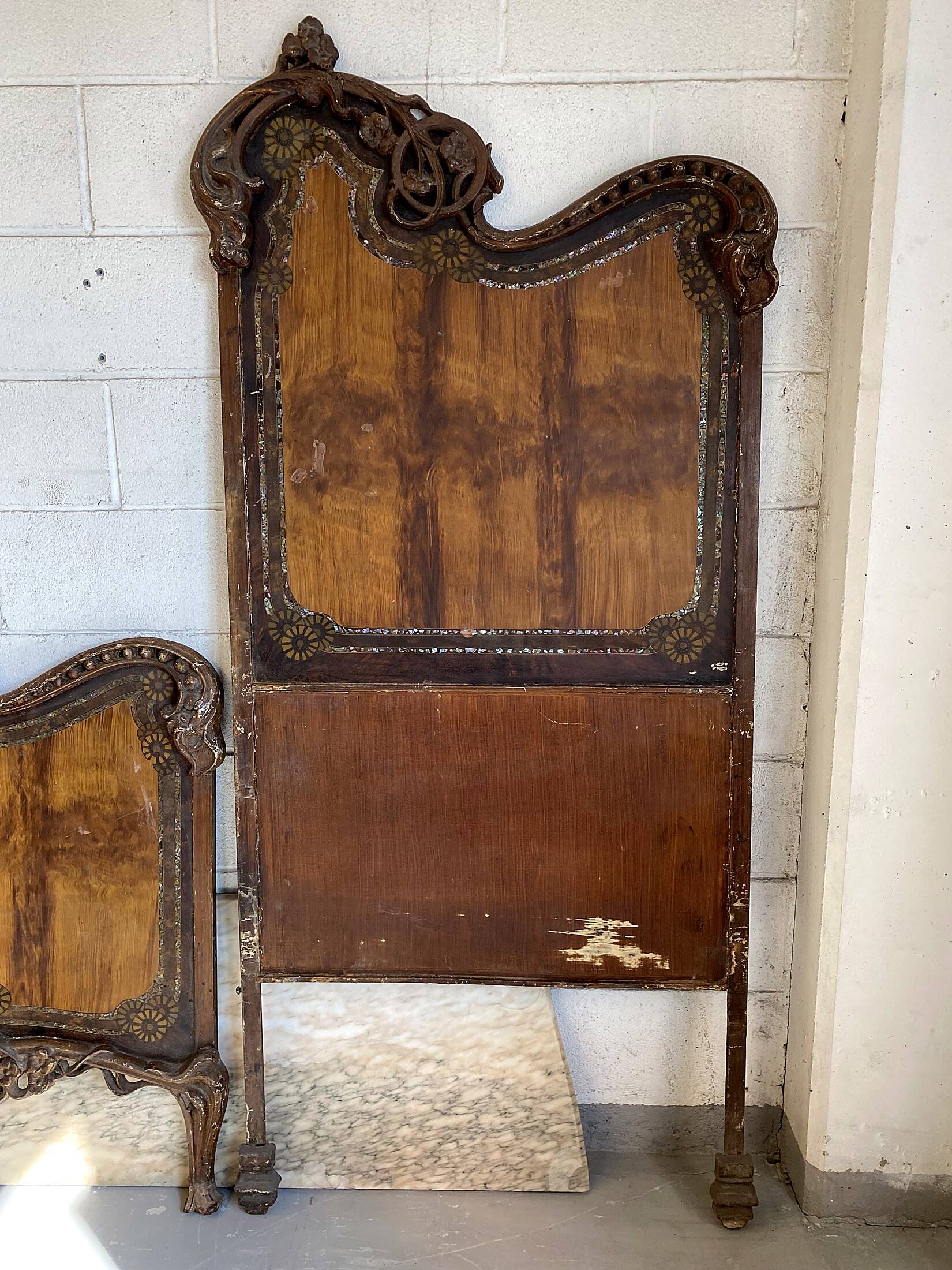 Pair of Art Nouveau cast iron headboards, Italy circa 1900