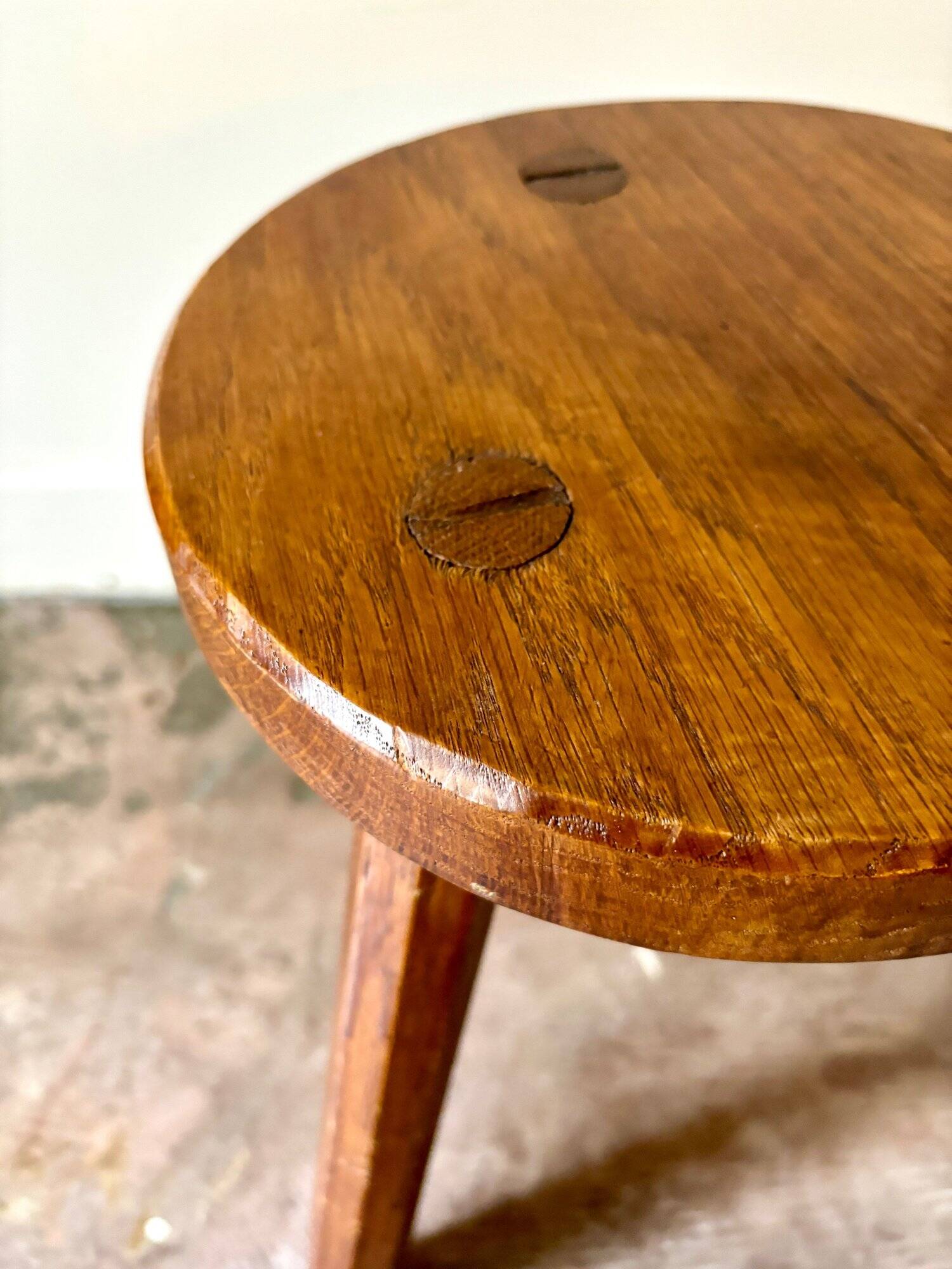 Dark wood tripod stool