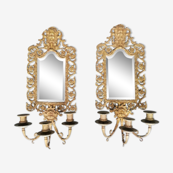 Pair of mirror wall sconces with candlesticks
