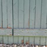 Pair of large wooden iron hanging shutters