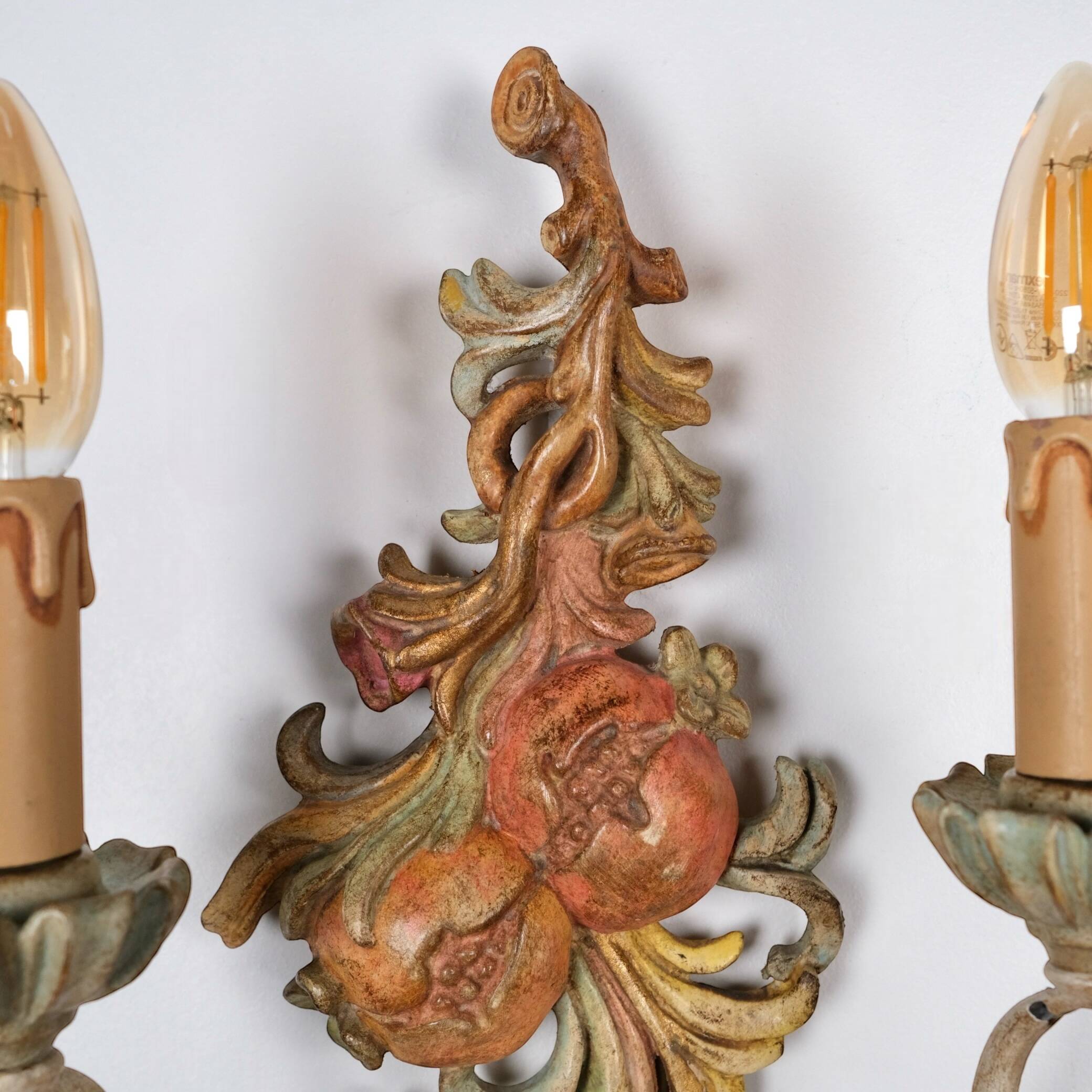 Pair of carved wood and metal sconces, Chelini FIrenze, Italy