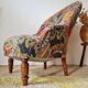 Small "madame" toad chair, vintage, upholstered in multicoloured floral fabric.
