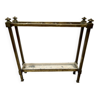 Brass and sheet metal umbrella stands from the 20th century.