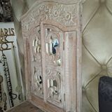Carved white wood mirror 1990 decorative carved with opening shutters on a square mirror