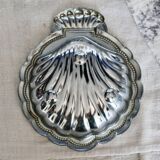Vintage shell pocket emptier in shiny silver metal
