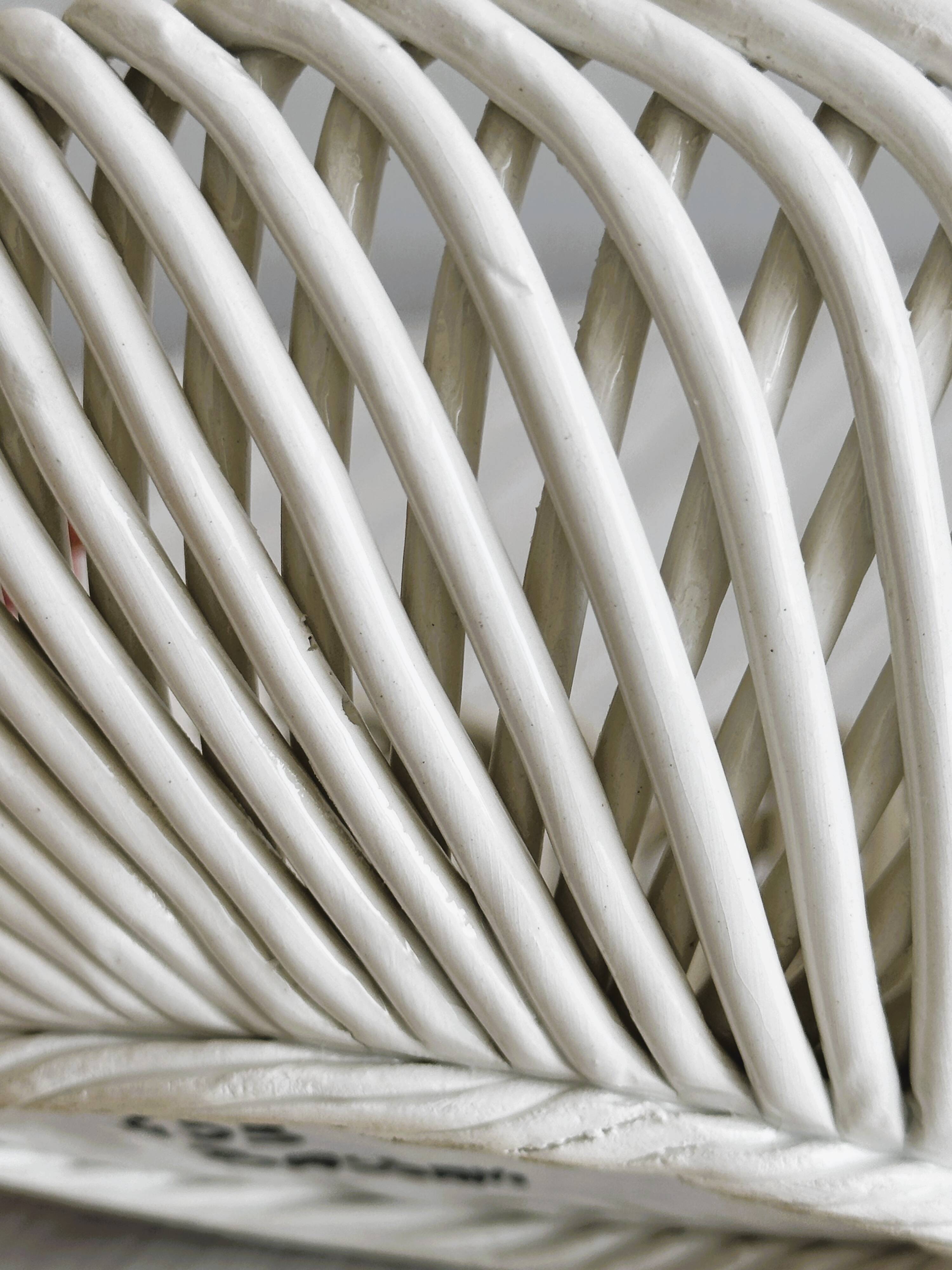 Small white ceramic twisted basket